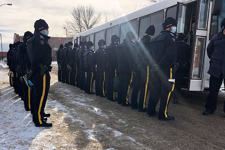 Cadets line up to get on the Depot bus.