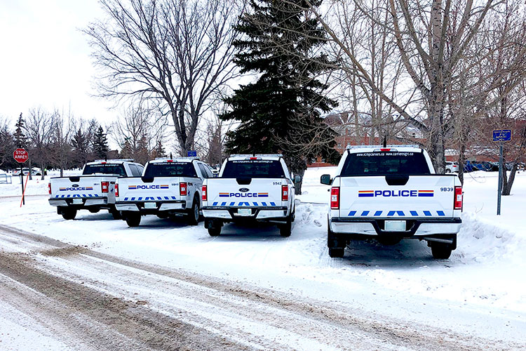 RCMP vehicles lined up diagonally