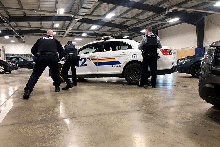 Cadets practice a vehicle extraction.