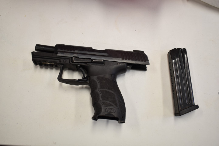 A search of the property incidental to the arrest resulted in officers locating and seizing a handgun with the serial number defaced, approximately 4 oz. of suspected cocaine, a sum of cash in both Canadian and US currency, a cross-bow, drug paraphernalia, knives, a machete and a hatchet. 