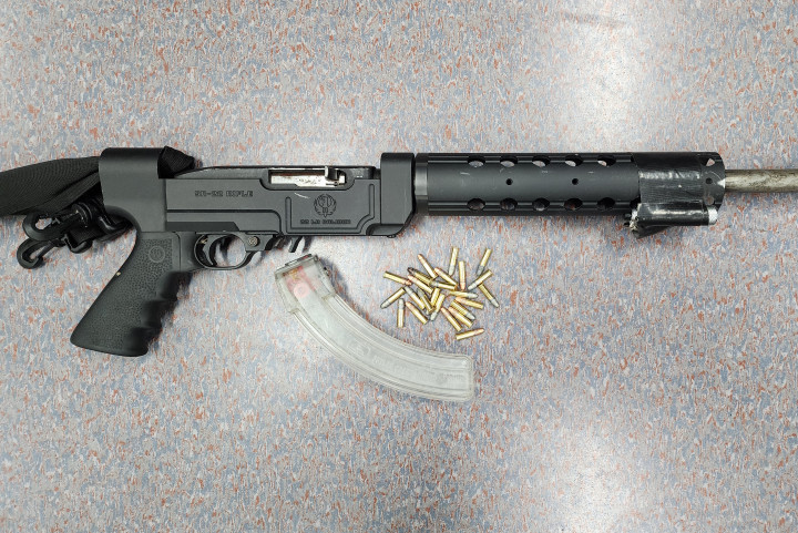 seized a loaded and modified semi-automatic firearm with a high capacity magazine