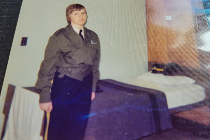 Corporal Ramsay stands beside her bed awaiting inspection at RCMP Depot 