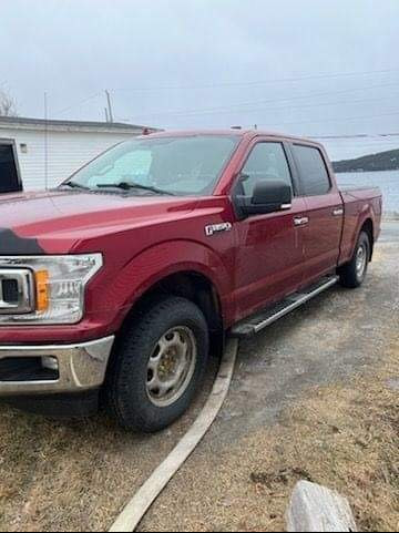 A red 2018 Ford F150.