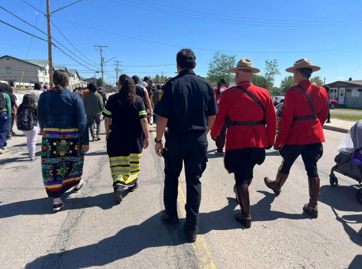 Officers from the Saskatchewan RCMP's Indigenous Policing Unit, Indigenous Recruiting Unit and La Ronge Detachment took part in a pipe ceremony, parade, and opening ceremonies at a National Indigenous People's Day event in La Ronge