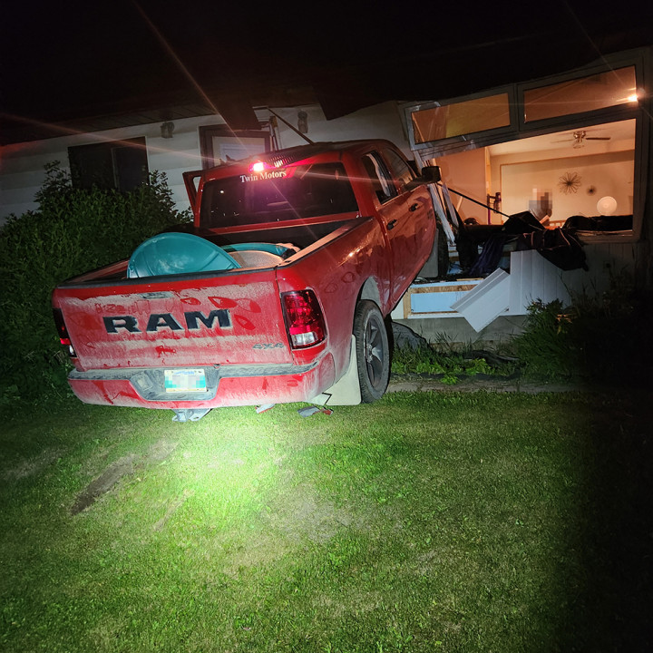 a vehicle had driven into the front of a home