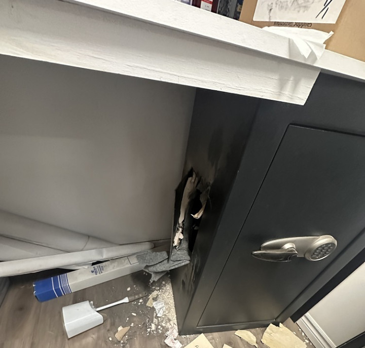 A safe inside a business is damaged.