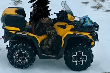 A yellow and black quad.