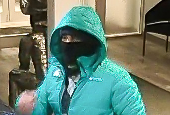 Security camera photo of the armed robbery suspect